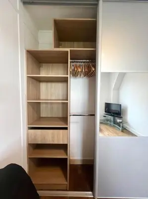 Cuisine ou kitchenette dans l'établissement Studio confortable proche Paris