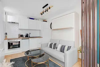 Cuisine ou kitchenette dans l'établissement Cosy Apt - 2P - République - Marais