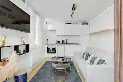 Cuisine ou kitchenette dans l'établissement Cosy Apt - 2P - République - Marais
