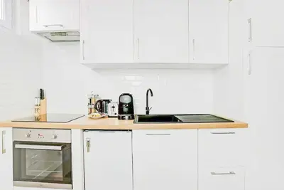 Cuisine ou kitchenette dans l'établissement Cosy Apt - 2P - République - Marais