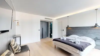 Un ou plusieurs lits dans un hébergement de l'établissement Bluestay 55 - Charmant appartement à Paris