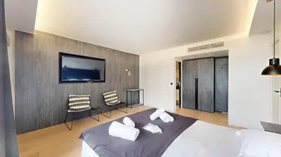 Un ou plusieurs lits dans un hébergement de l'établissement Bluestay 55 - Charmant appartement à Paris