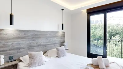 Un ou plusieurs lits dans un hébergement de l'établissement Bluestay 56 - Superbe appartement à Paris
