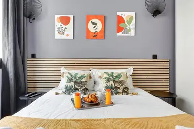 Un ou plusieurs lits dans un hébergement de l'établissement Bluestay 58 - Superbe appartement à Paris