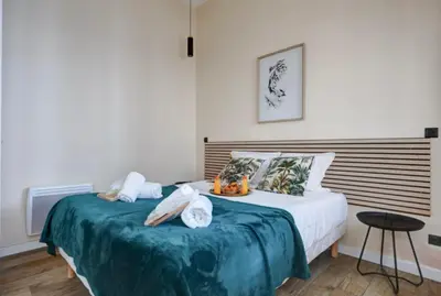 Un ou plusieurs lits dans un hébergement de l'établissement Bluestay 58 - Superbe appartement à Paris