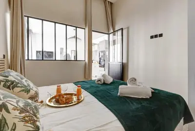 Un ou plusieurs lits dans un hébergement de l'établissement Bluestay 58 - Superbe appartement à Paris