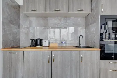Cuisine ou kitchenette dans l'établissement Bluestay 58 - Superbe appartement à Paris