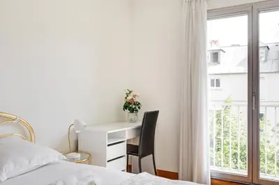 Un ou plusieurs lits dans un hébergement de l'établissement Élégance Parisienne, Vue Luxueuse Imprenable