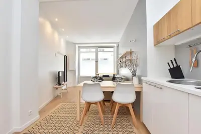 Cuisine ou kitchenette dans l'établissement GoodGuest-Appartement Design et Cosy Batignolles