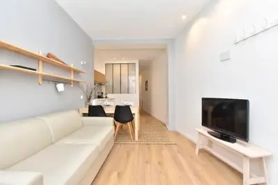 Télévision ou salle de divertissement dans l'établissement GoodGuest-Appartement Design et Cosy Batignolles