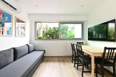 Coin salon dans l'établissement Appartement Climatisé Porte Versailles