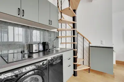 Cuisine ou kitchenette dans l'établissement Pick A Flat's Apartments in Montmartre - Rue des Cottages