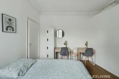 Un ou plusieurs lits dans un hébergement de l'établissement Flexliving - room - Lemoine