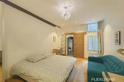 Un ou plusieurs lits dans un hébergement de l'établissement Flexliving - studio - Lemoine