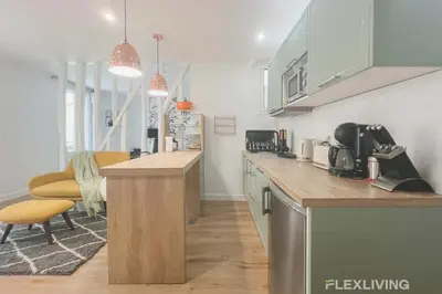 Cuisine ou kitchenette dans l'établissement Flexliving - T2 - Garibaldi
