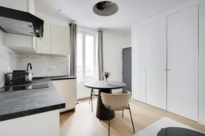 Cuisine ou kitchenette dans l'établissement Pick A Flat's Apartment in Sentier-Montorgueil - Rue du Nil