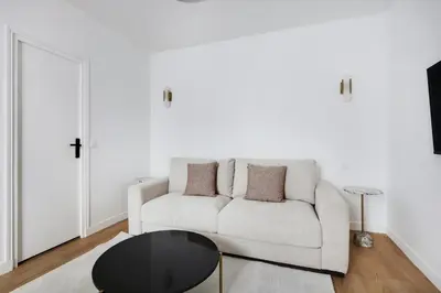 Coin salon dans l'établissement Pick A Flat's Apartment in Sentier-Montorgueil - Rue du Nil