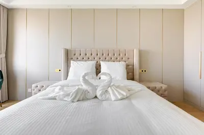 Un ou plusieurs lits dans un hébergement de l'établissement 101 Penthouse Royal à Paris avec Vue Imprenable sur la Tour Eiffel