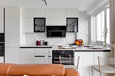 Cuisine ou kitchenette dans l'établissement 101 Penthouse Royal à Paris avec Vue Imprenable sur la Tour Eiffel