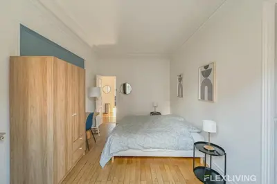 Un ou plusieurs lits dans un hébergement de l'établissement Flexliving - whole flat - Felix Faure