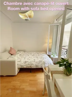 Un ou plusieurs lits dans un hébergement de l'établissement Chambre privée, sdb partagé, Arc de Triomphe, métro 1, T3b, RER c e a