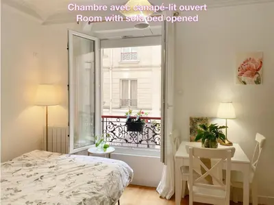 Un ou plusieurs lits dans un hébergement de l'établissement Chambre privée, sdb partagé, Arc de Triomphe, métro 1, T3b, RER c e a