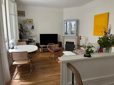 Télévision ou salle de divertissement dans l'établissement Comme une petite maison