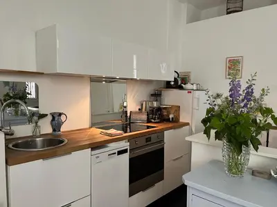 Cuisine ou kitchenette dans l'établissement Comme une petite maison