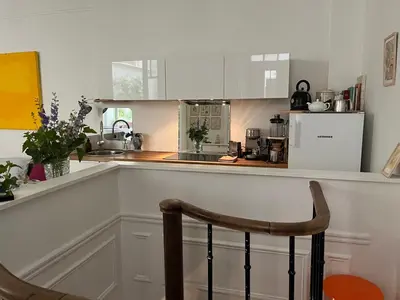 Cuisine ou kitchenette dans l'établissement Comme une petite maison