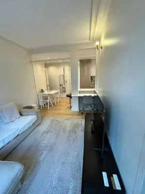 Coin salon dans l'établissement Charmant Appartement Alésia