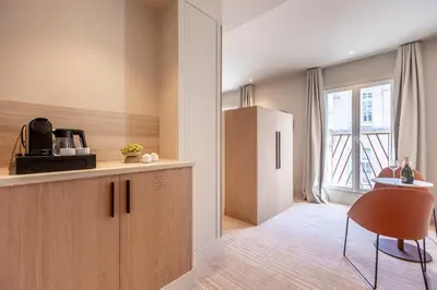 Cuisine ou kitchenette dans l'établissement Suites FL By Sweett