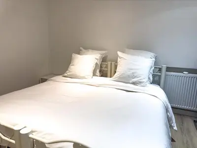Un ou plusieurs lits dans un hébergement de l'établissement PenBed - Montparnasse 1 - 3 pièces