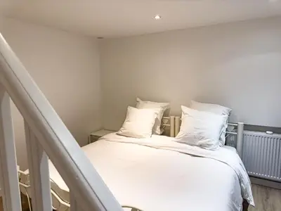 Un ou plusieurs lits dans un hébergement de l'établissement PenBed - Montparnasse 1 - 3 pièces
