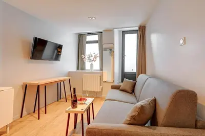 Coin salon dans l'établissement Bluestay 252 - Duplex au cœur de Paris