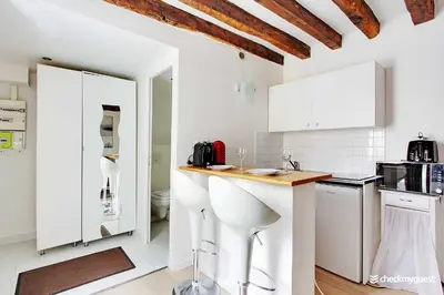 Cuisine ou kitchenette dans l'établissement Cozy studio 2P - Rue Mouffetard