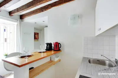 Cuisine ou kitchenette dans l'établissement Cozy studio 2P - Rue Mouffetard
