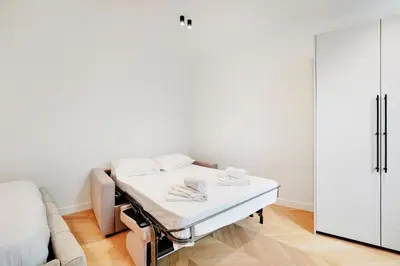 Un ou plusieurs lits dans un hébergement de l'établissement Saint-Honore - Sublime appartement 3 personnes