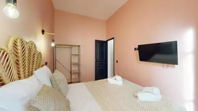 Un ou plusieurs lits dans un hébergement de l'établissement Bluestay 47 - Appartement au cœur de Paris