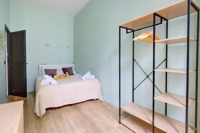 Un ou plusieurs lits dans un hébergement de l'établissement Bluestay 47 - Appartement au cœur de Paris