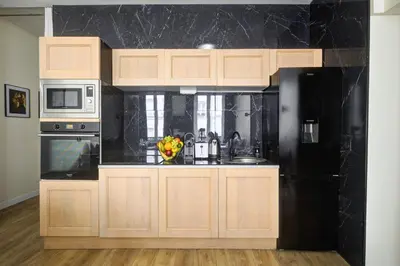 Cuisine ou kitchenette dans l'établissement Bluestay 47 - Appartement au cœur de Paris