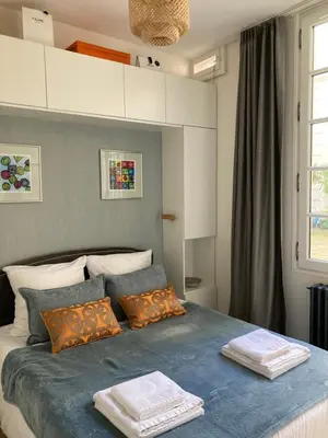 Un ou plusieurs lits dans un hébergement de l'établissement CENTRAL and COSY 1 bedroom apartment
