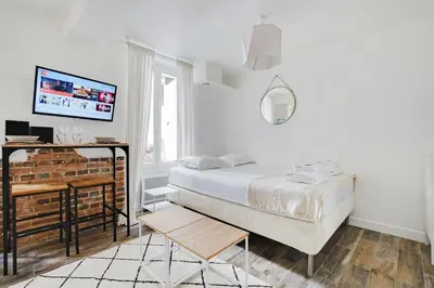 Un ou plusieurs lits dans un hébergement de l'établissement Charming studio - 2P - Center of Paris