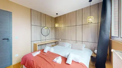 Un ou plusieurs lits dans un hébergement de l'établissement Bluestay 88 - Superbe appartement à Paris