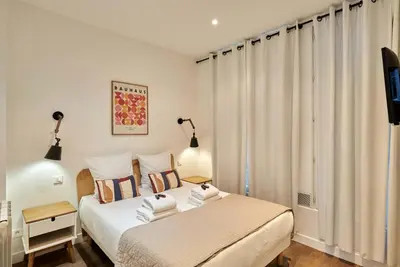 Un ou plusieurs lits dans un hébergement de l'établissement Apartment 2 bedrooms Center of Paris