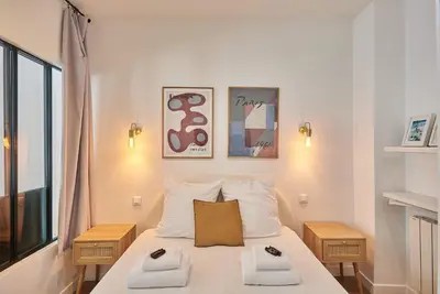 Un ou plusieurs lits dans un hébergement de l'établissement Apartment 2 bedrooms Center of Paris