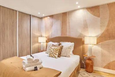 Un ou plusieurs lits dans un hébergement de l'établissement Charming flat in the heart of Paris