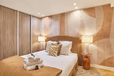 Un ou plusieurs lits dans un hébergement de l'établissement Charming flat in the heart of Paris