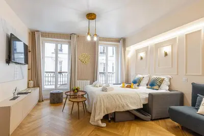 Un ou plusieurs lits dans un hébergement de l'établissement Bluestay 159 - Charmant appartement à Paris 2