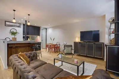 Télévision ou salle de divertissement dans l'établissement Apartment in the Center of Paris by studioprestige