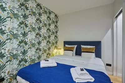 Un ou plusieurs lits dans un hébergement de l'établissement Apartment in the Center of Paris by studioprestige